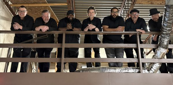 The Domino Band — group photo at the rehearsal space